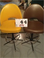 Upholstered swivel bar stools 25 inches tall to
