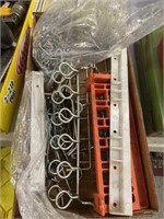 Box of pegboard hooks and tool holders