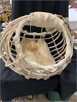 Basket made with copra  and twigs. 21 inches wide
