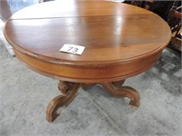 Round Oak Table with Ornate Base