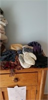 Group of hats, scarves, mitts, helmet