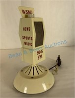 advertising transistor radio 99 FM