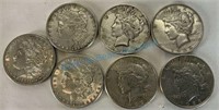 Group of seven Morgan and peace dollars so much a