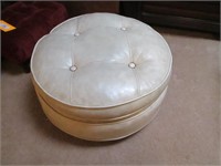 Round White Hassock with Wheels.