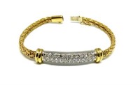 18K Ladies' Bracelet with 34 Diamonds.