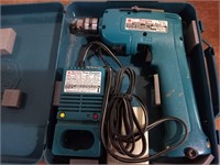 Makita 9.6 volt cordless drill & charger