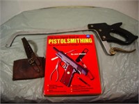 MEAT SAW, AXE COVER AND PISTOL BOOK