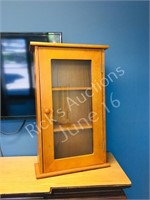 sm. wood curio cabinet w/ glass door 17" x 27"