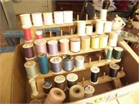THREAD HOLDER AND SEVERAL SPOOLS OF THREAD