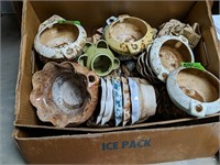 Box Of Ceramic Planters. In Garage