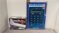 NIB COLOSSAL CALCULATOR & SAFETY CAN OPENER