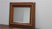 Mirror mounted in antique for a 3.5 inches by 27
