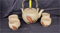 Clay teapot and cups