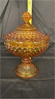 Amber glass hobnail dish with lid
