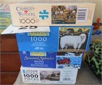 Four 1000 piece jigsaw puzzles, 3 are Charles