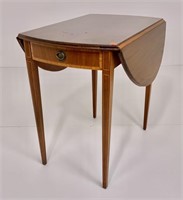 Mahogany Pembroke end table, oval top has drop