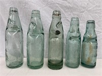 5 assorted embossed marble bottles