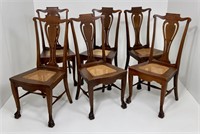 6 Mahogany dining chairs, cane seats, animal claw
