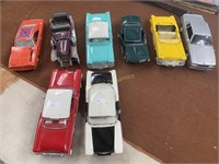 Eight Die Cast Cars, some broken, some not