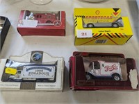 Four boxed Model cars