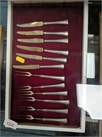 Silver handled knives and forks