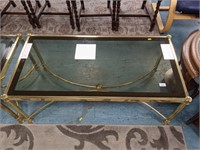 Large brass, glass top table