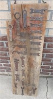 Specialty wrenches on barn board