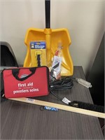 Shovel/first aid kit/seat belt cutter