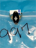 AVON LARGE OVAL BLACK STONE WITH CLEAR CENTER