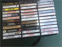 Country music cassettes plus case