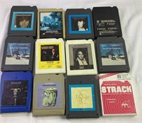 A lot of 12 miscellaneous eight track tapes