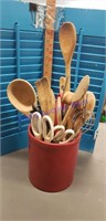 Wooden utensils in a crock