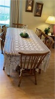 Large wooden table w/ (6) padded chairs