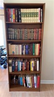 5-tiered wooden bookshelf w/ assortment of mostly