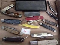 13 pocket knives, stones