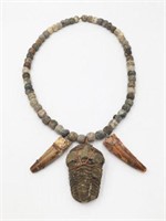 Necklace with Dinosaur Teeth & Ancient Trilobite.