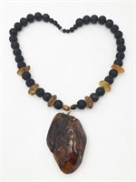 Lava Bead Necklace w/Huge Polished Amber Pendant.