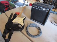 Behringer Six String Elec. Guitar, & Rogue Amp