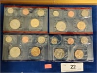 Four mint coin sets