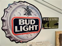 Bud Light and Welcome signs