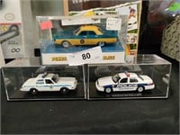 3 Diecast Police car replicas
