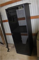 black shelf unit with glass door 22" x 20" x 62' l
