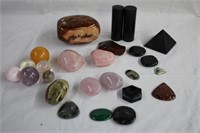 Assorted tumbled and shaped stones and crystals