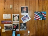 LOT OF PICTURES ON WALL- GEORGE W. BUSH,