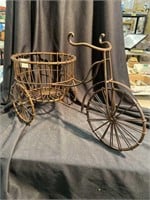 All metal tricycle planter. 24 inches long 12