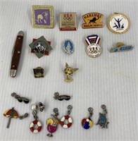 Lot includes pins, small pocket knife and charms
