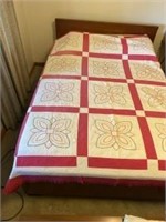 Handmade old quilt shows a little fading but in