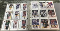 Binder of 1990-91 Upper Deck hockey cards