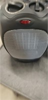 Oscillating ceramic heater with adjustable sermon