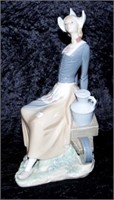 Lladro Dutch milkmaid with wheelbarrow figure